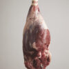 lamb leg raw mead on rope for smoking process
