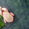 vue de dessus poulet cru frais sur fond sombre repas de poulet photo animal couleur nourriture cuisine viande espace libre
